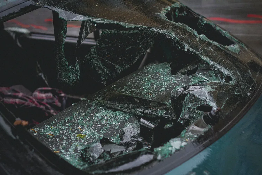 Shattered windshield of a car after an accident